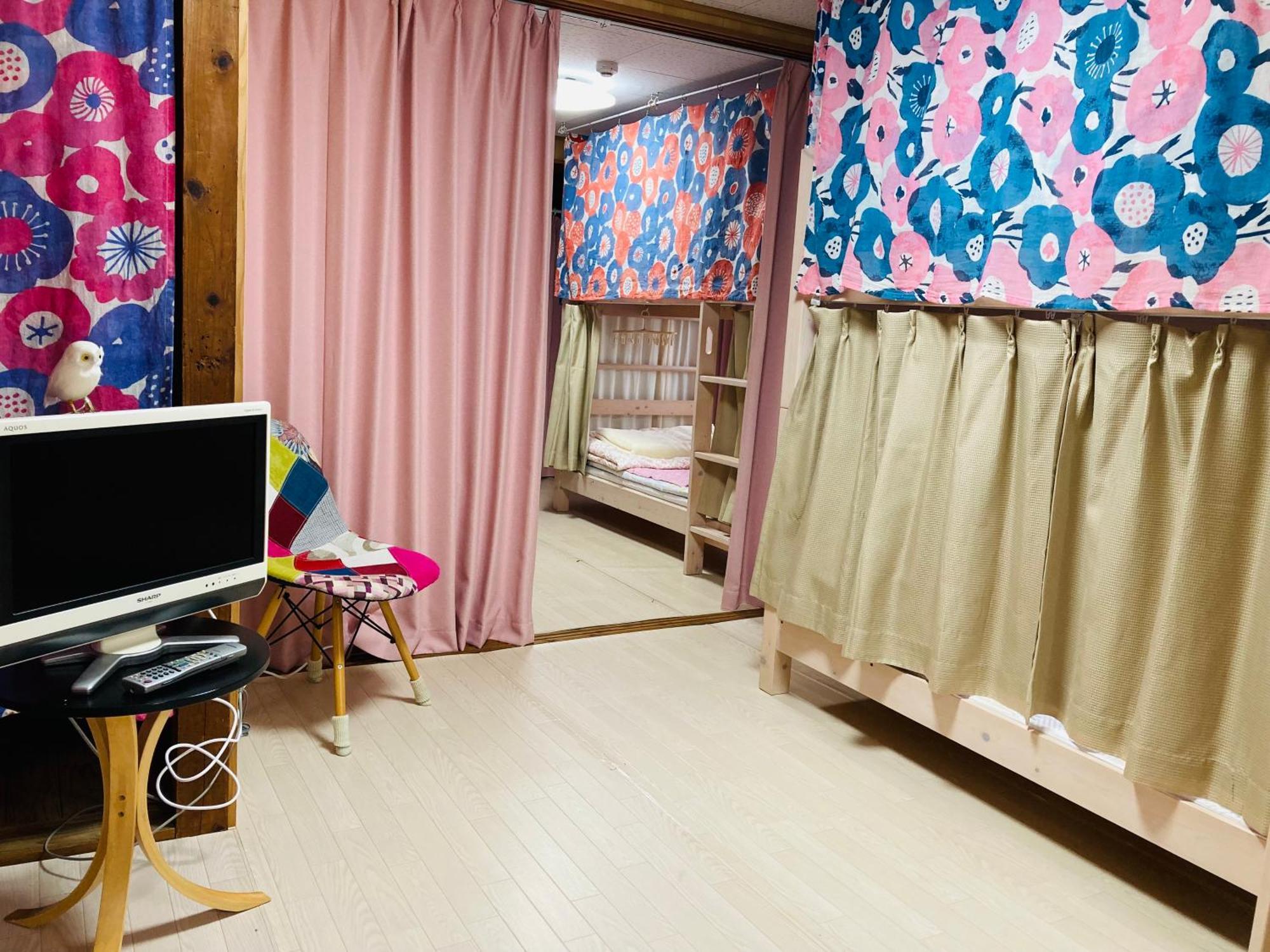 Guesthouse Perche Female Only Amami Esterno foto