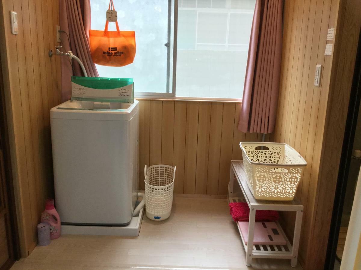 Guesthouse Perche Female Only Amami Esterno foto
